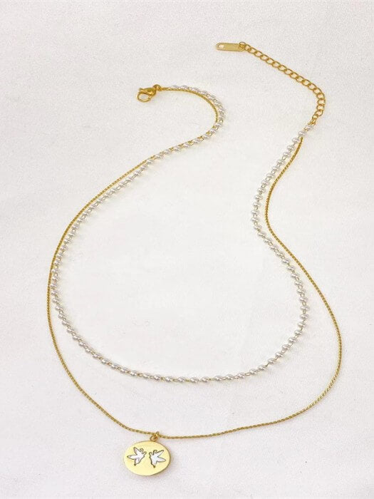 Collier avec pendentif disque de perles classique et élégant